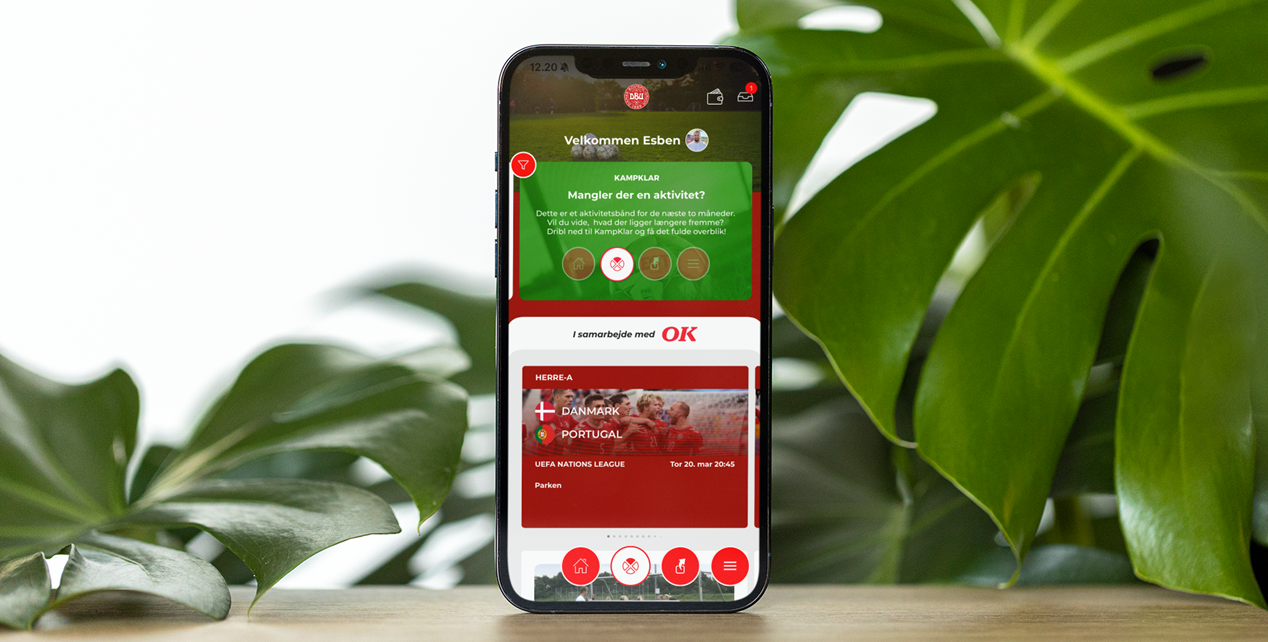 iphone-12-pro-max-mockup-featuring-some-plants-in-the-background-m21862.png