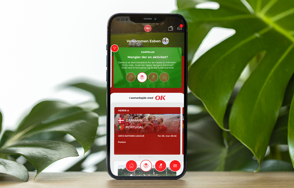 iphone-12-pro-max-mockup-featuring-some-plants-in-the-background-m21862.png